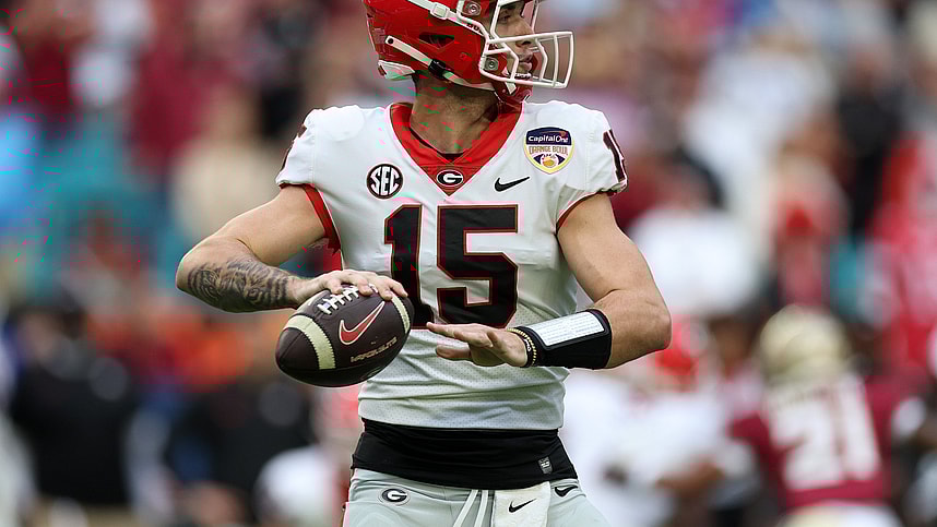 Dec 30, 2023; Miami Gardens, FL, USA; Georgia Bulldogs quarterback Carson Beck (New York Giants prospect) (15) drops back to pass against the Florida State Seminoles during the first half in the 2023 Orange Bowl at Hard Rock Stadium. Mandatory Credit: Nathan Ray Seebeck-USA TODAY Sports