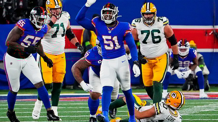 Dec 11, 2023; East Rutherford, New Jersey, USA; New York Giants linebacker Azeez Ojulari (51) celebrates after making a sack on Green Bay Packers quarterback Jordan Love (10) during the fourth quarter at MetLife Stadium. Mandatory Credit: Robert Deutsch-USA TODAY Sports