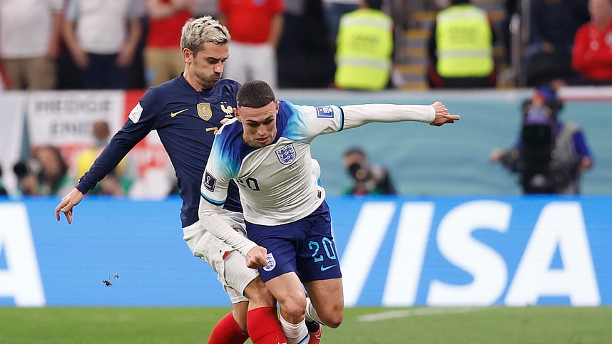 Dec 10, 2022; Al Khor, Qatar; England midfielder Phil Foden (Manchester City) (20) and France forward Antoine Griezmann (7) battle for the ball during the first half of a quarterfinal game in the 2022 FIFA World Cup at Al-Bayt Stadium. Mandatory Credit: Yukihito Taguchi-USA TODAY Sports