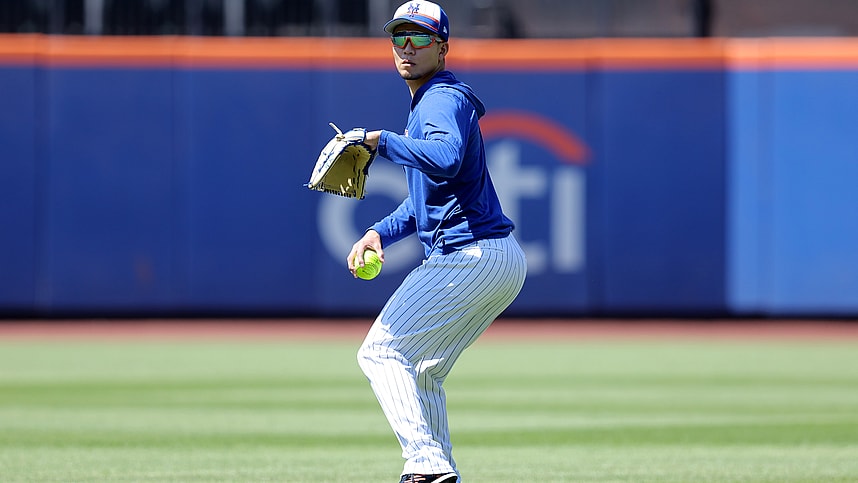 Jun 1, 2024; New York City, New York, USA; New York Mets injured starting pitcher Kodai Senga (34) throws a softball in the outfield before a game against the Arizona Diamondbacks at Citi Field. Mandatory Credit: Brad Penner-USA TODAY Sports