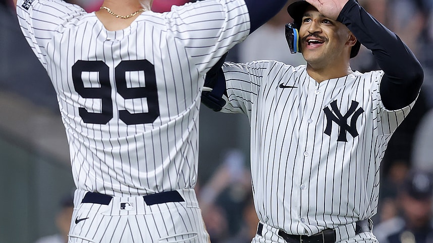 Jun 9, 2024; Bronx, New York, USA; New York Yankees center fielder Trent Grisham (12) celebrates his three run home run against the Los Angeles Dodgers with right fielder Aaron Judge (99) during the sixth inning at Yankee Stadium. Mandatory Credit: Brad Penner-USA TODAY Sports