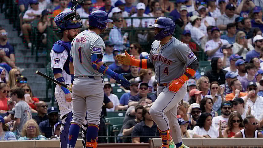 Jun 22, 2024; Chicago, Illinois, USA; New York Mets catcher Francisco Alvarez (4) is greeted by second baseman Jeff McNeil (1) after hitting a home run against the Chicago Cubs during the fifth inning at Wrigley Field. Mandatory Credit: David Banks-USA TODAY Sports