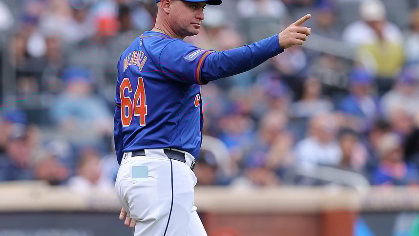 May 14, 2024; New York City, New York, USA; New York Mets manager Carlos Mendoza (64) makes a pitching change during the seventh inning against the Philadelphia Phillies at Citi Field. Mandatory Credit: Brad Penner-USA TODAY Sports