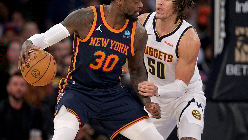 Jan 25, 2024; New York, New York, USA; New York Knicks forward Julius Randle (30) controls the ball against Denver Nuggets forward Aaron Gordon (50) during the first quarter at Madison Square Garden. Mandatory Credit: Brad Penner-USA TODAY Sports