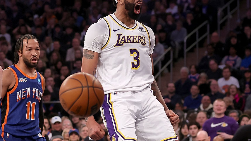 Feb 3, 2024; New York, New York, USA; Los Angeles Lakers forward Anthony Davis (3) reacts after a dunk against New York Knicks guard Jalen Brunson (11) during the first quarter at Madison Square Garden. Mandatory Credit: Brad Penner-USA TODAY Sports