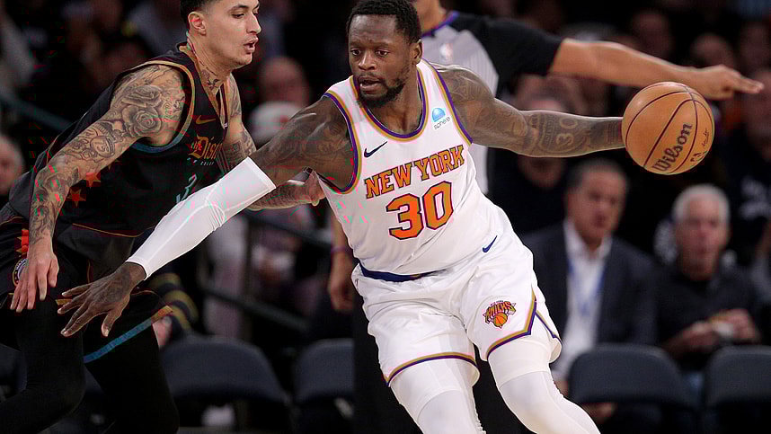 Jan 18, 2024; New York, New York, USA; New York Knicks forward Julius Randle (30) controls the ball against Washington Wizards forward Kyle Kuzma (33) during the third quarter at Madison Square Garden. Mandatory Credit: Brad Penner-USA TODAY Sports