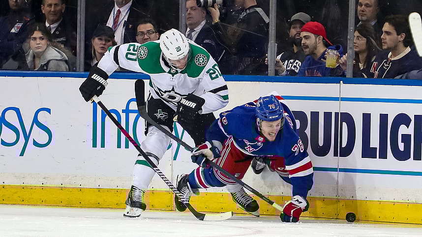 Jan 12, 2023; New York, New York, USA; Dallas Stars defenseman Ryan Suter (20) and New York Rangers center Jonny Brodzinski (76) battle for the puck during the third period at Madison Square Garden. Mandatory Credit: Danny Wild-USA TODAY Sports
