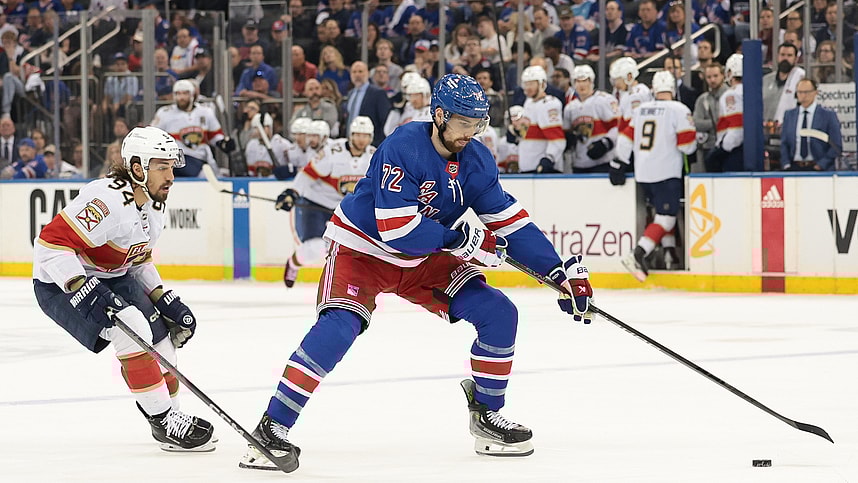 May 24, 2024; New York, New York, USA; New York Rangers center Filip Chytil (72) plays the puck in front of Florida Panthers left wing Ryan Lomberg (94) during the first period in game two of the Eastern Conference Final of the 2024 Stanley Cup Playoffs at Madison Square Garden. Mandatory Credit: Vincent Carchietta-USA TODAY Sports
