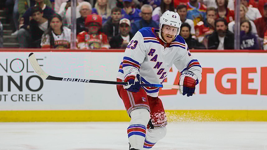May 28, 2024; Sunrise, Florida, USA; New York Rangers defenseman Adam Fox (23) shoots the puck against the Florida Panthers during the third period in game four of the Eastern Conference Final of the 2024 Stanley Cup Playoffs at Amerant Bank Arena. Mandatory Credit: Sam Navarro-USA TODAY Sports