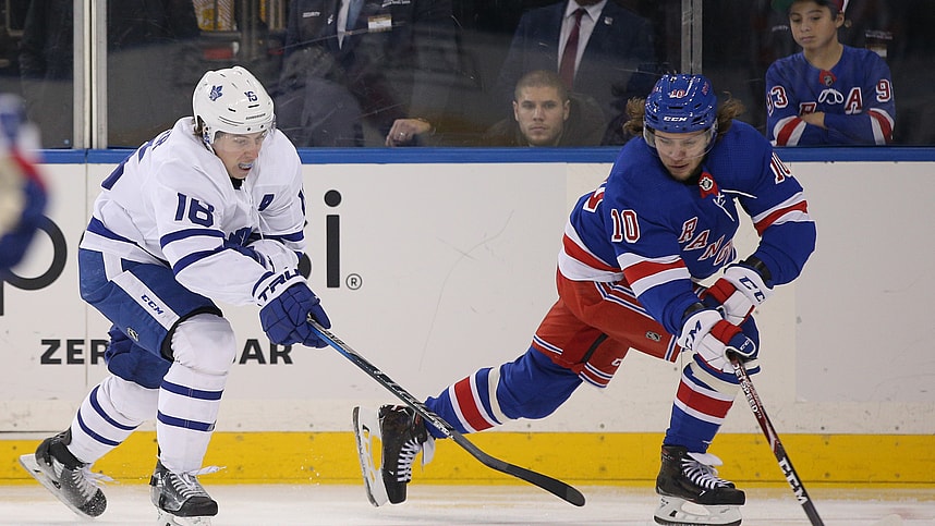 Dec 20, 2019; New York, NY, USA; Toronto Maple Leafs center Mitch Marner (16) steals the puck away from New York Rangers left wing Artemi Panarin (10) during the third period at Madison Square Garden. Mandatory Credit: Brad Penner-USA TODAY Sports