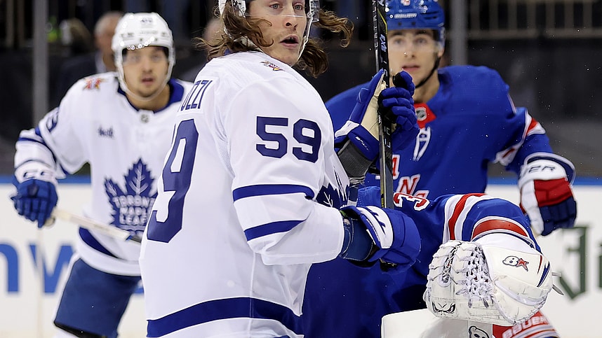 Dec 12, 2023; New York, New York, USA; Toronto Maple Leafs left wing Tyler Bertuzzi (59) watches the puck fly by his head in front of New York Rangers defenseman Braden Schneider (4) and goaltender Igor Shesterkin (31) during the third period at Madison Square Garden. Mandatory Credit: Brad Penner-USA TODAY Sports