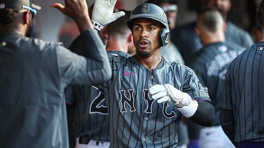 Jul 13, 2024; New York City, New York, USA; New York Mets shortstop Francisco Lindor (12) is greeted in the dugout after hitting a three run home run in the eighth inning against the Colorado Rockies at Citi Field. Mandatory Credit: Wendell Cruz-USA TODAY Sports