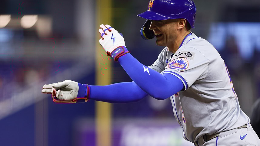 Jul 19, 2024; Miami, Florida, USA; New York Mets left fielder Brandon Nimmo (9) reacts from first base after hitting a single against the Miami Marlins during the third inning at loanDepot Park. Mandatory Credit: Sam Navarro-USA TODAY Sports