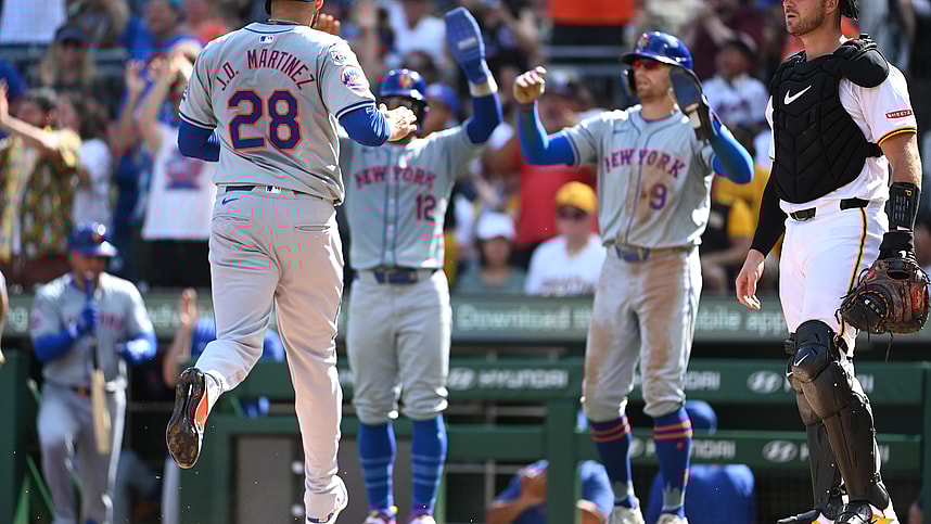 Jul 6, 2024; Pittsburgh, Pennsylvania, USA;  New York Mets base runner J.D. Martinez (28) scores by Pittsburgh Pirates catcher Joey Bart (14) befote being greeted by Francisco Lindor (12) and Brandon Nimmo (9) during the third inning at PNC Park. Mandatory Credit: Philip G. Pavely-USA TODAY Sports