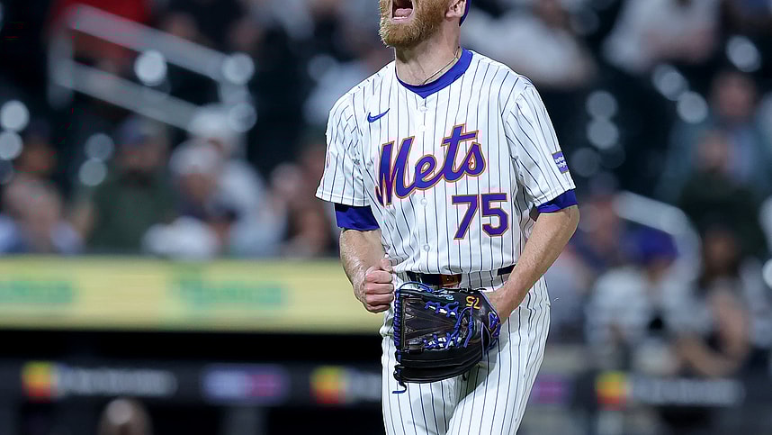 Jun 25, 2024; New York City, New York, USA; New York Mets relief pitcher Reed Garrett (75) reacts after getting the final out against the New York Yankees at Citi Field. Mandatory Credit: Brad Penner-USA TODAY Sports
