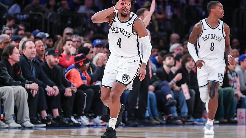 Mar 23, 2024; New York, New York, USA; Brooklyn Nets guard Dennis Smith Jr. (4) gestures after making a three point shot in the fourth quarter against the New York Knicks at Madison Square Garden. Mandatory Credit: Wendell Cruz-USA TODAY Sports