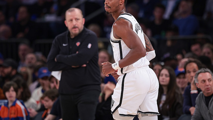 Apr 12, 2024; New York, New York, USA; Brooklyn Nets guard Lonnie Walker IV (8) runs up court after a basket in front of New York Knicks head coach Tom Thibodeau during the first half at Madison Square Garden. Mandatory Credit: Vincent Carchietta-USA TODAY Sports