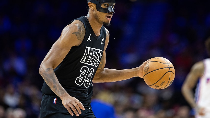 Apr 14, 2024; Philadelphia, Pennsylvania, USA; Brooklyn Nets center Nic Claxton (33) dribbles the ball against the Philadelphia 76ers during the first quarter at Wells Fargo Center. Mandatory Credit: Bill Streicher-USA TODAY Sports