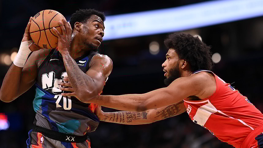 Mar 27, 2024; Washington, District of Columbia, USA;  Brooklyn Nets center Day'Ron Sharpe (20) looks to pass as Washington Wizards forward Marvin Bagley III (35) defends during the first half at Capital One Arena. Mandatory Credit: Tommy Gilligan-USA TODAY Sports