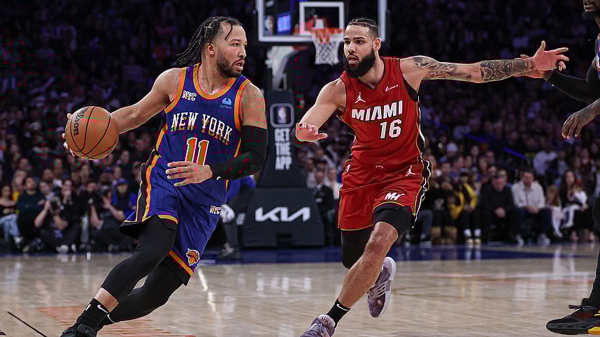 Jan 27, 2024; New York, New York, USA; New York Knicks guard Jalen Brunson (11) dribbles against Miami Heat forward Caleb Martin (16) during the second half at Madison Square Garden. Mandatory Credit: Vincent Carchietta-USA TODAY Sports