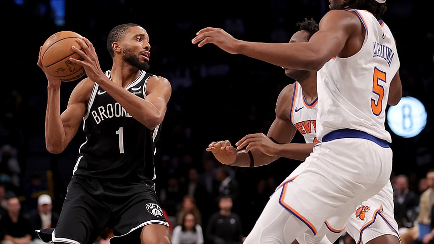 Jan 23, 2024; Brooklyn, New York, USA; Brooklyn Nets forward Mikal Bridges (1) looks to pass the ball against New York Knicks forwards OG Anunoby (8) and Precious Achiuwa (5) during the fourth quarter at Barclays Center. Mandatory Credit: Brad Penner-USA TODAY Sports