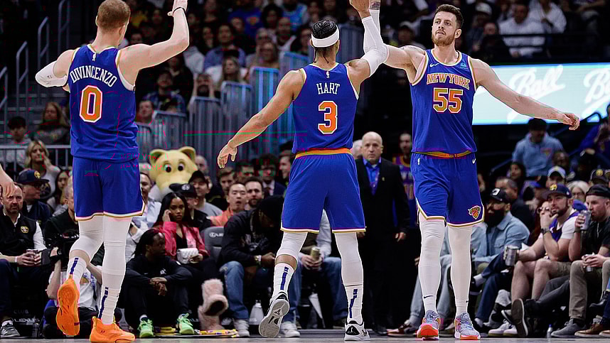 Mar 21, 2024; Denver, Colorado, USA; New York Knicks center Isaiah Hartenstein (55) reacts with guard Josh Hart (3) and guard Donte DiVincenzo (0) in the second quarter against the Denver Nuggets at Ball Arena. Mandatory Credit: Isaiah J. Downing-USA TODAY Sports