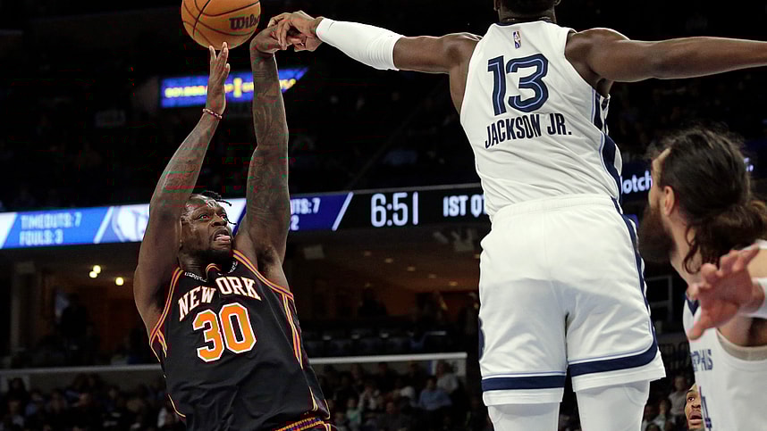 Mar 11, 2022; Memphis, Tennessee, USA; New York Knicks forward Julius Randle (30) shoots as Memphis Grizzlies forward Jaren Jackson Jr. (13) blocks his shot during the first half at FedExForum. Mandatory Credit: Petre Thomas-USA TODAY Sports