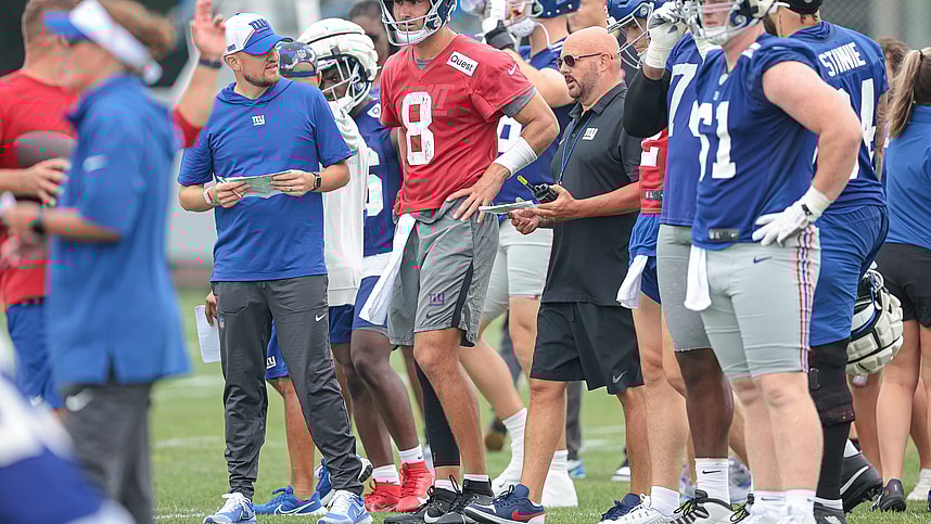 Jul 24, 2024; East Rutherford, NJ, USA; New York Giants quarterback Daniel Jones (8) talks with head coach Brian Dabol during training camp at Quest Diagnostics Training Facility. Mandatory Credit: Vincent Carchietta-USA TODAY Sports