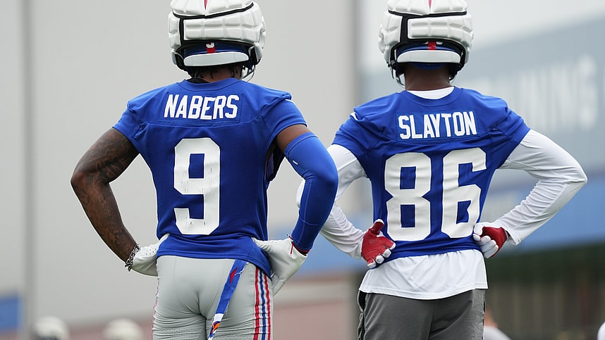 Jul 25, 2024; East Rutherford, NY, USA; New York Giants wide receiver Malik Nabers (9) and wide receiver Darius Slayton (86) look on during training camp at Quest Diagnostics Training Center. Mandatory Credit: Lucas Boland-USA TODAY Sports