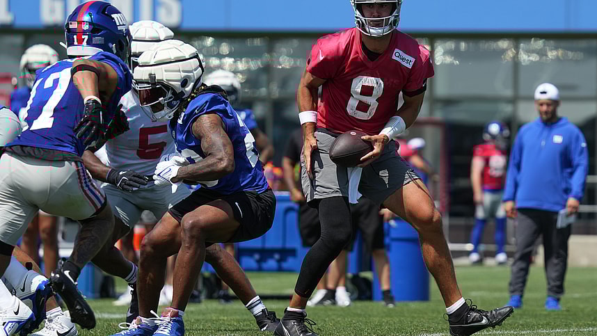 Jul 26, 2024; East Rutherford, NJ, USA; New York Giants quarterback Daniel Jones (8) fakes a handoff during training camp at Quest Diagnostics Training Center. Mandatory Credit: Lucas Boland-USA TODAY Sports