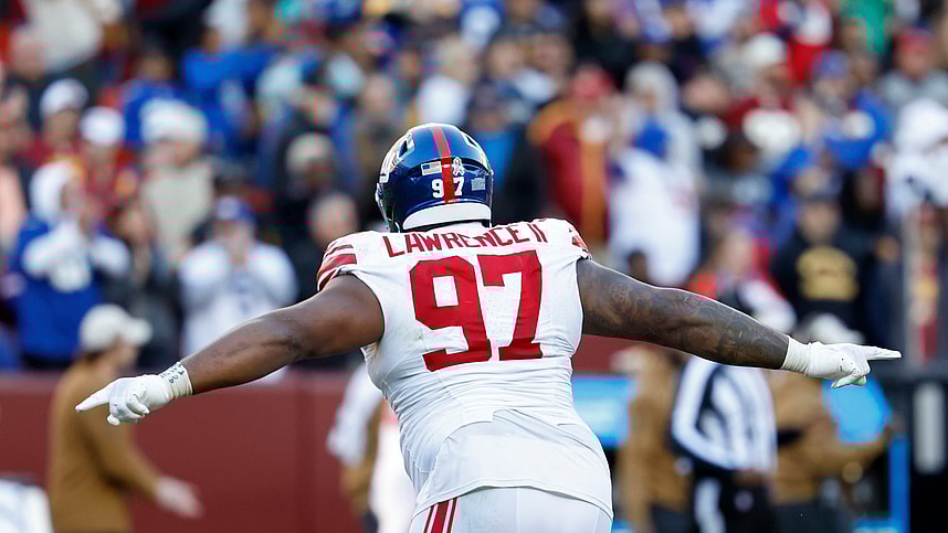 Nov 19, 2023; Landover, Maryland, USA; New York Giants defensive tackle Dexter Lawrence II (97) celebrates after an interception against the Washington Commanders during the fourth quarter at FedExField. Mandatory Credit: Geoff Burke-USA TODAY Sports