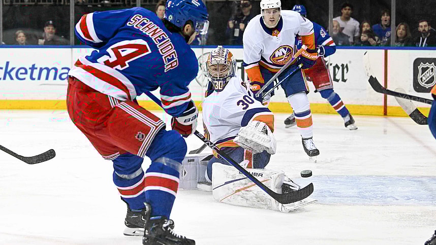 Apr 13, 2024; New York, New York, USA;  New York Rangers defenseman Braden Schneider (4) shoots and scores a goal past New York Islanders goaltender Ilya Sorokin (30) during the second period at Madison Square Garden. Mandatory Credit: Dennis Schneidler-USA TODAY Sports