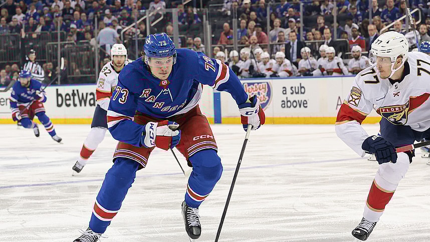 May 24, 2024; New York, New York, USA; New York Rangers center Matt Rempe (73) skates up ice as Florida Panthers defenseman Niko Mikkola (77) defends during the second period in game two of the Eastern Conference Final of the 2024 Stanley Cup Playoffs at Madison Square Garden. Mandatory Credit: Vincent Carchietta-USA TODAY Sports