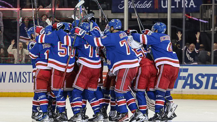 May 24, 2024; New York, New York, USA; New York Rangers center Barclay Goodrow (21) celebrates his game-winning overtime goal with teammates in game two of the Eastern Conference Final of the 2024 Stanley Cup Playoffs against the Florida Panthers at Madison Square Garden. Mandatory Credit: Vincent Carchietta-USA TODAY Sports