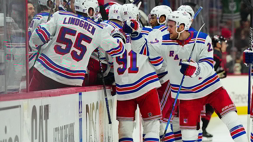 May 16, 2024; Raleigh, North Carolina, USA; New York Rangers defenseman Adam Fox (23) and defenseman Ryan Lindgren (55) celebrate center Barclay Goodrow (21) (not shown) goal against the Carolina Hurricanes during the third period in game six of the second round of the 2024 Stanley Cup Playoffs at PNC Arena. Mandatory Credit: James Guillory-USA TODAY Sports