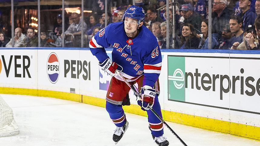 Apr 21, 2024; New York, New York, USA; New York Rangers defenseman Ryan Lindgren (55) controls the puck in the third period against the Washington Capitals in game one of the first round of the 2024 Stanley Cup Playoffs at Madison Square Garden. Mandatory Credit: Wendell Cruz-USA TODAY Sports