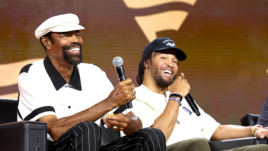 NEW YORK, NEW YORK (KNICKS) - AUGUST 16: (L-R) Walt Frazier and Jalen Brunson speak onstage at the Fanatics Fest NYC 2024 at Jacob Javits Center on August 16, 2024 in New York City. (Photo by Kevin Mazur/Getty Images for Fanatics)