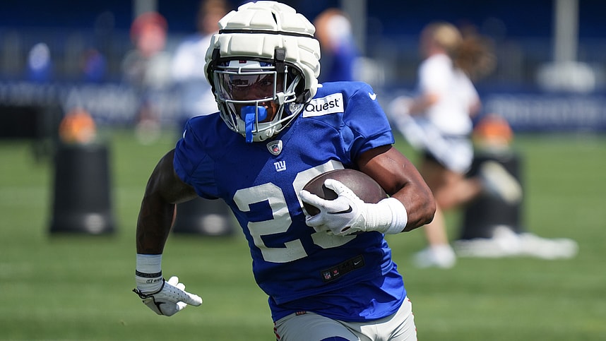 Jul 26, 2024; East Rutherford, NJ, USA; New York Giants running back Tyrone Tracy Jr. (29) carries a ball during training camp at Quest Diagnostics Training Center. Mandatory Credit: Lucas Boland-USA TODAY Sports