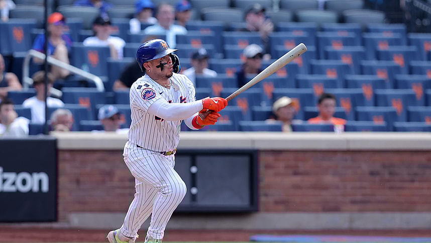 Jul 31, 2024; New York City, New York, USA; New York Mets catcher Francisco Alvarez (4) follows through on an RBI ground out during the ninth inning against the Minnesota Twins at Citi Field. Mandatory Credit: Brad Penner-USA TODAY Sports