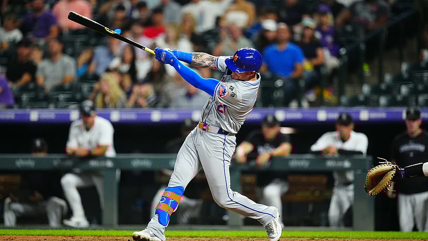 Aug 7, 2024; Denver, Colorado, USA; New York Mets outfielder Ben Gamel (21) singles in the seventh inning against the Colorado Rockies at Coors Field. Mandatory Credit: Ron Chenoy-USA TODAY Sports