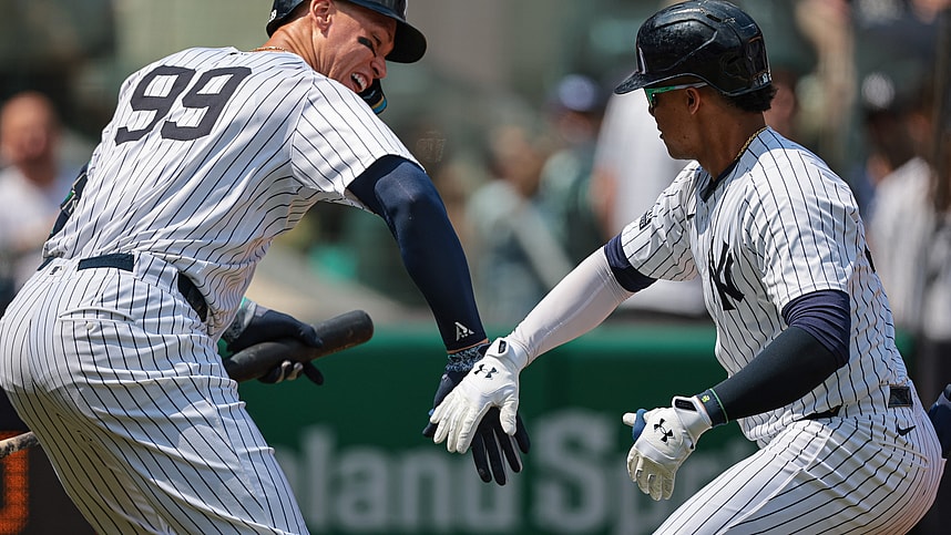 Aug 11, 2024; Bronx, New York, USA; New York Yankees right fielder Juan Soto (22) celebrates with New York Yankees center fielder Aaron Judge (99) after hitting a solo home run during the third inning against the Texas Rangers at Yankee Stadium. Mandatory Credit: Vincent Carchietta-USA TODAY Sports, MLB