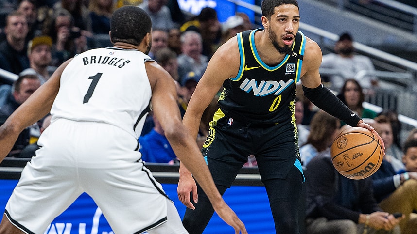Mar 16, 2024; Indianapolis, Indiana, USA; Indiana Pacers guard Tyrese Haliburton (0) dribbles the ball while Brooklyn Nets forward Mikal Bridges (1) (New York Knicks)defends in the first half at Gainbridge Fieldhouse. Mandatory Credit: Trevor Ruszkowski-USA TODAY Sports