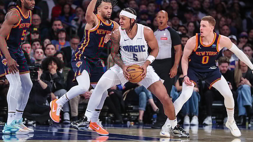 Mar 8, 2024; New York, New York, USA; Orlando Magic forward Paolo Banchero (5) looks to drive past New York Knicks guard Jalen Brunson (11) in the fourth quarter at Madison Square Garden. Mandatory Credit: Wendell Cruz-USA TODAY Sports