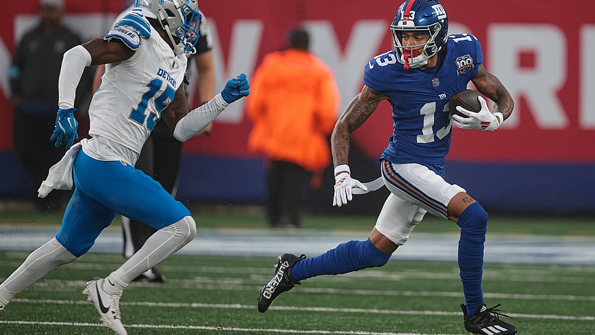 Aug 8, 2024; East Rutherford, New Jersey, USA; New York Giants wide receiver Jalin Hyatt (13) gains yards after catch as Detroit Lions cornerback Ennis Rakestraw Jr. (15) pursues at MetLife Stadium. Mandatory Credit: Vincent Carchietta-USA TODAY Sports