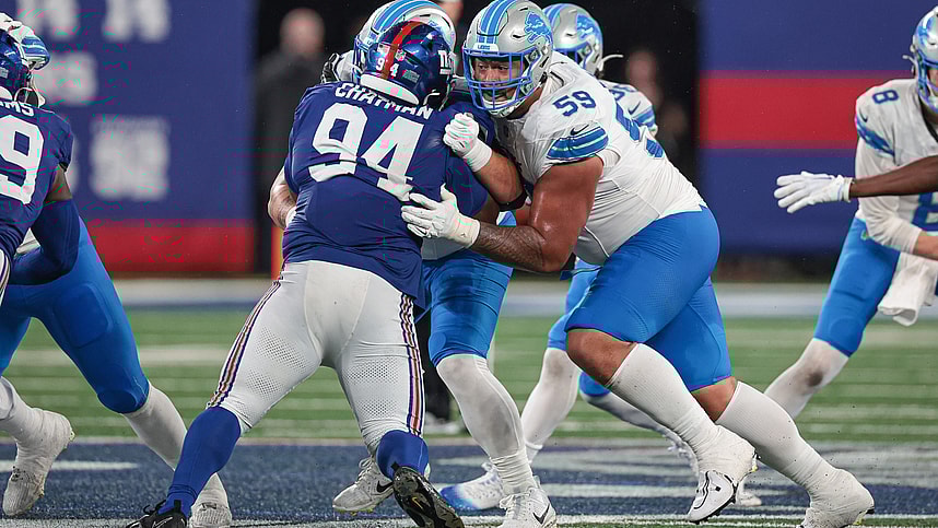Aug 8, 2024; East Rutherford, New Jersey, USA; Detroit Lions offensive tackle Giovanni Manu (59) blocks New York Giants defensive tackle Elijah Chatman (94) during the second half at MetLife Stadium. Mandatory Credit: Vincent Carchietta-USA TODAY Sports