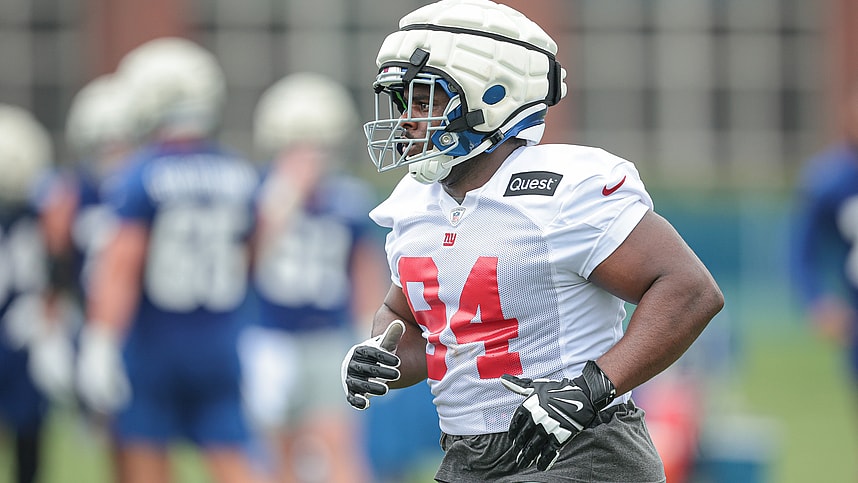 Jul 24, 2024; East Rutherford, NJ, USA; New York Giants defensive tackle Elijah Chatman (94) runs on the field during training camp at Quest Diagnostics Training Facility. Mandatory Credit: Vincent Carchietta-USA TODAY Sports