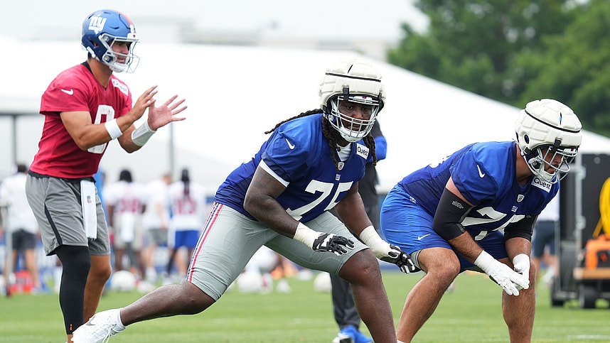 Jul 25, 2024; East Rutherford, NY, USA; New York Giants offensive tackle Joshua Ezeudu (75) participates in a drill during training camp at Quest Diagnostics Training Center. Mandatory Credit: Lucas Boland-USA TODAY Sports
