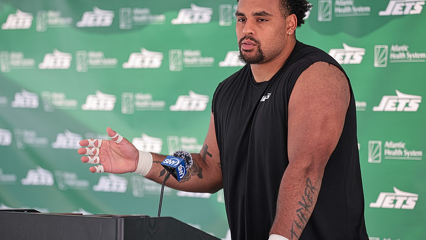 Jul 27, 2024; Florham Park, NJ, USA; New York Jets offensive tackle Olu Fashanu (74) talks with media during training camp at Atlantic Health Jets Training Center. Mandatory Credit: Vincent Carchietta-USA TODAY Sports