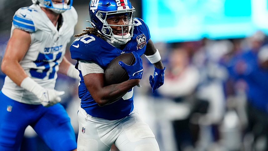 New York Giants running back Eric Gray (20) runs towards the end zone for the first touchdown of the game,, Thursday, August 8 2024, in East Rutherford.