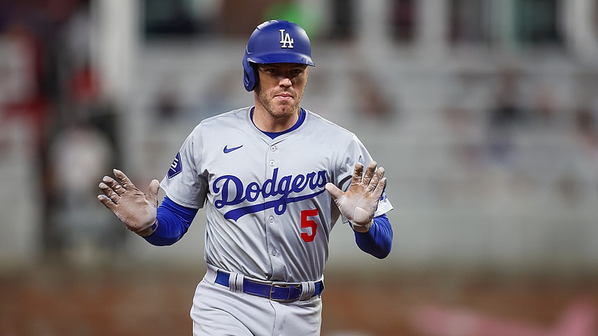 Sep 16, 2024; Atlanta, Georgia, USA; Los Angeles Dodgers first baseman Freddie Freeman (5) celebrates after a three-run home run against the Atlanta Braves in the seventh inning at Truist Park. Mandatory Credit: Brett Davis-Imagn Images